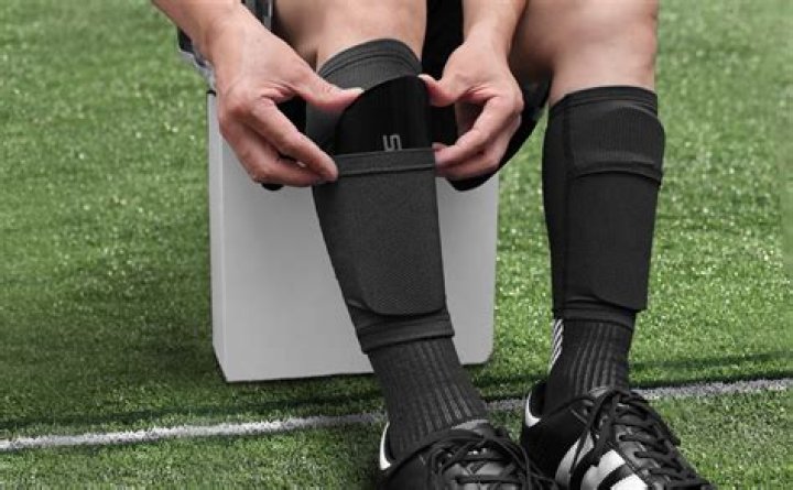Why do footballers wear Shinpads?