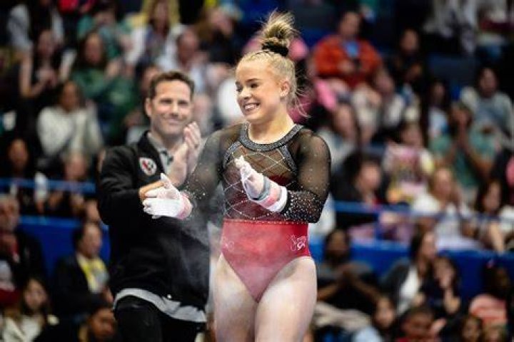 Why do gymnasts tape their wrists after a routine?