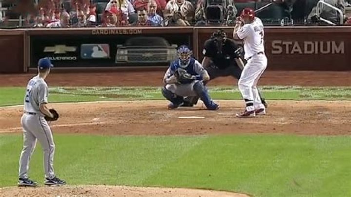 Why do pitchers massage the ball?