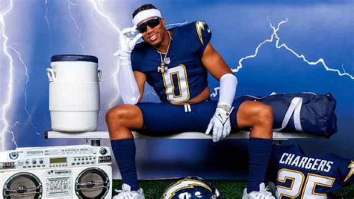 Why do the Chargers wear white at home?