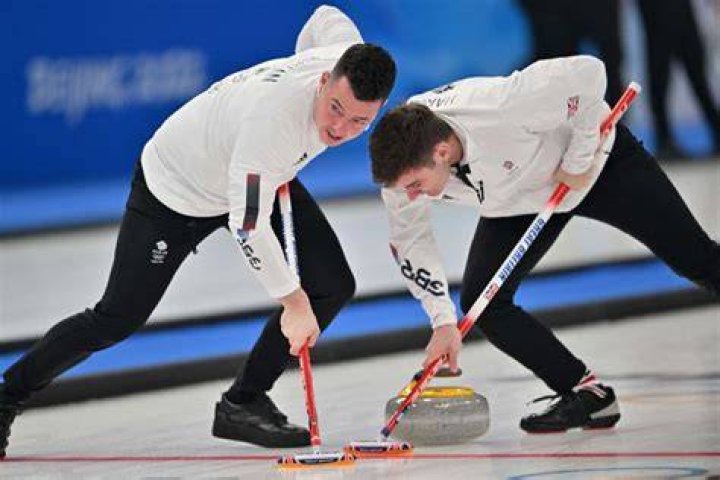 Why do they brush the ice in curling?
